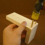 Tap the dowels into their holes with a small mallet