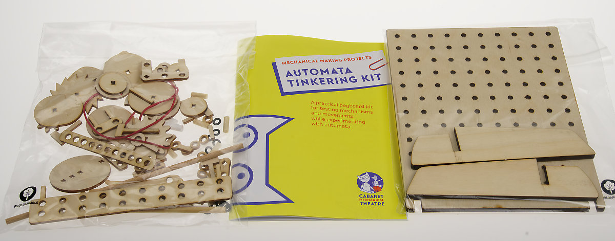 Bag of small parts, instruction booklet, pegboard laid flat