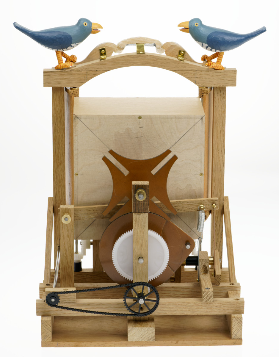 The back of the piece showing the geneva wheel mechanism