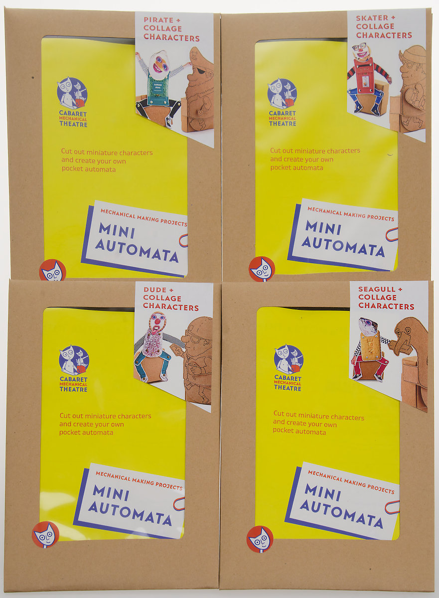 4 envelopes with clear windows showing the mini automata kit cover.