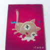 Rectangular pink magnet with cartoon image of cat collapsed in milk