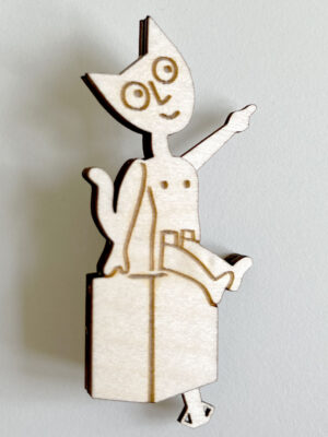 A small barecat made of laser cut and engraved birch ply. He is smiling and pointing up.