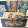 4 brightly painted cardboard automata
