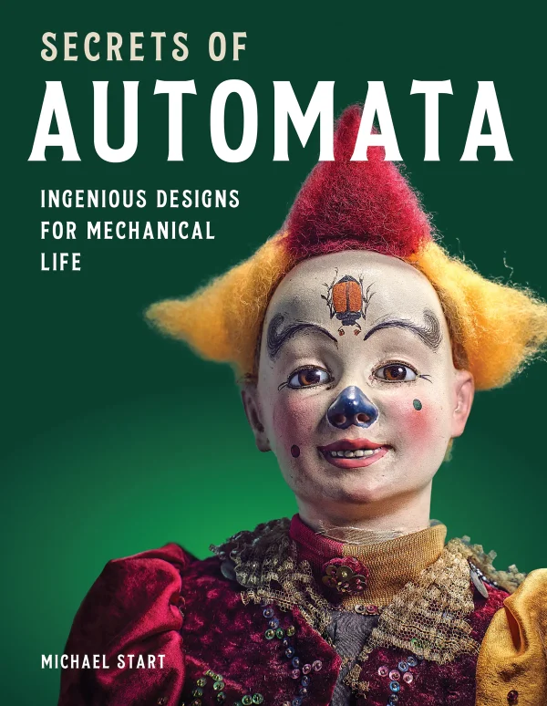 Secrets of Automata Book Cover A clown automaton on a green background