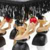 4 hand carved and painted doll figures in black dress, white tights, pink ballet shoes. They stare straight ahead holding giant strawberries in fornt of their faces.